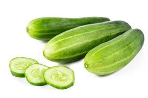 Wet cucumber isolated on white background. fresh wet cucumber isolated on white background. fresh wet cucumber isolated on white background. photo