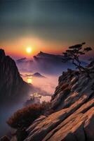 the sun is setting over a mountain range. . photo