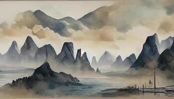The mountains in the morning fog, all I see is the river across the mountains. photo