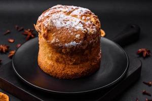 Delicious fresh christmas pie with fruit and raisin panettone photo