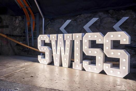 Illuminated swiss text structure at Jungfrau railway inside Bernese Alps photo