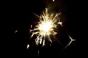 sparklers on a black background photo