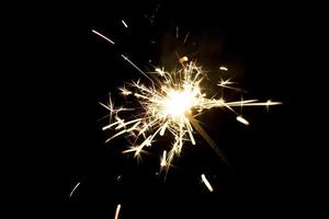 sparklers on a black background photo