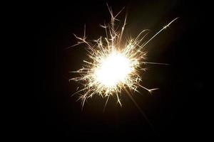 sparklers on a black background photo