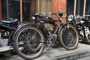 original old vintage retro vintage motorbikes standing in the museum photo