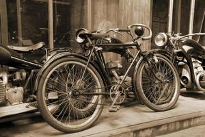 original old vintage retro vintage motorbikes standing in the museum photo