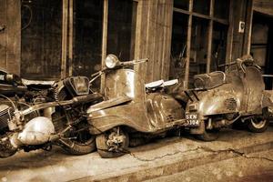 original old vintage retro vintage motorbikes standing in the museum photo