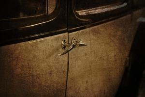 old vintage metal details car in the museum close-up photo