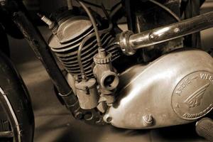 original old vintage retro vintage motorbikes standing in the museum photo