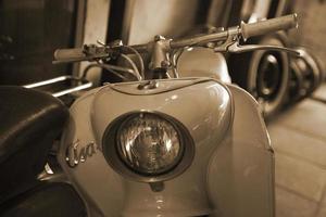 original old vintage retro vintage motorbikes standing in the museum photo