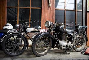 original old vintage retro vintage motorbikes standing in the museum photo