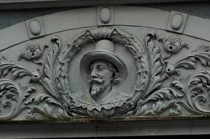 interesting original historic architectural details in the Polish city of Gdansk forming the background photo