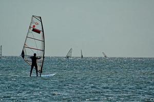 windsurfing on the bay of pucka on the baltic sea photo