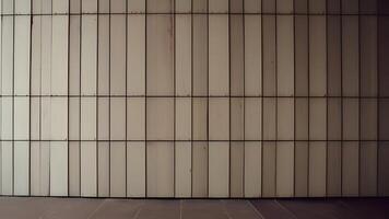 A wall with a white tile photo