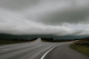 A road with a cloudy sky and a sign that says I m the only one on the right photo