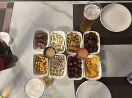 Close up of assorted snacks on a table in a restaurant photo