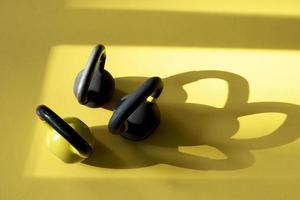 three kettlebells on the yellow floor photo