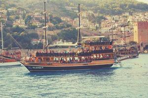 original landscape of the port and city of Alanya in Turkey from the sea photo