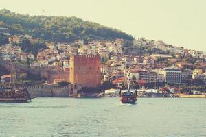 original landscape of the port and city of Alanya in Turkey from the sea photo