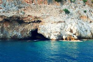 original landscape of the port and city of Alanya in Turkey from the sea photo