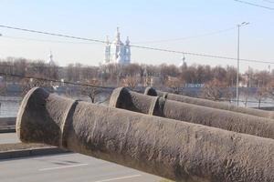 old cannons in front of the smolny cathedral in st. petersburg photo