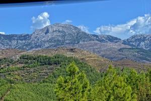 beautiful view of the Turkish mountains covered with green forest on a summer day, photo