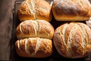 Freshly baked bread on a wooden board, close-up.Bagel photo