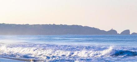 Extremely huge big surfer waves beach La Punta Zicatela Mexico. photo