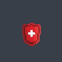 red shield with plus sign in pixel art style vector