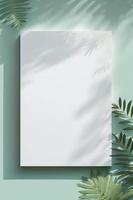 Blank white drawing canvas on mint colored surface with palm leaves, home plants and soft floral shadows, generate ai photo