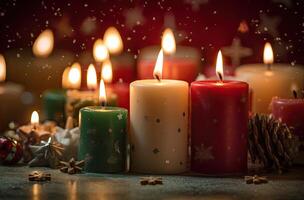 Burning candle and Christmas decoration over snow and wooden background. . photo