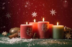 Burning candle and Christmas decoration over snow and wooden background. . photo