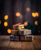 Christmas presents wrapped in red paper with gold ribbon on on wooden table background and bokeh. Place for typography and logo. Copy space. . photo