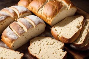 Freshly baked bread on a wooden board, close-up. French bread. photo