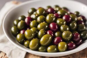 Fresh salad with green olives, feta cheese and cherry tomatoes in a bowl. Healthy salad. photo
