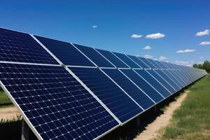 Row of solar panels installed on a field of green grass. photo