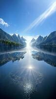 large body of water with mountains in the background. . photo