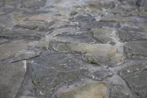 texture of a stone background with different size stones photo