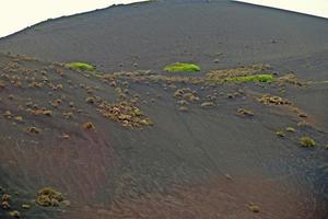 orignal volcanic landscapes from the Spanish island of Lanzarote photo