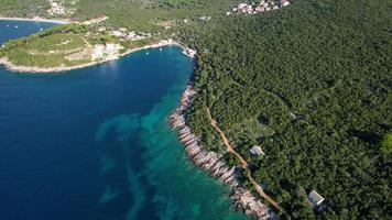 aerial, rock formation in a beautiful beach video