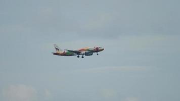 PHUKET, THAILAND NOVEMBER 27, 2017 - Passenger plane of Bangkok Air approaching to landing at Phuket airport. Tourism and travel concept. Long shot of airplane flies video