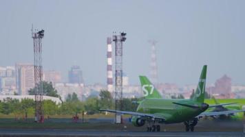 NOVOSIBIRSK, RUSSIAN FEDERATION JUNE 17, 2020 - Embraer E170 of S7 Airlines departure at Tolmachevo airport OVB. Tourism and travel concept video