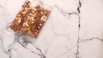 Putting packet of mixed nuts on table video