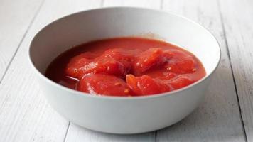 preserved caned tomato in a bowl video
