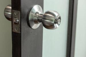 Stainless Steel Door knob with Wooden and Frosted Glass Door photo
