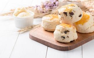 scones on wood block with barley photo