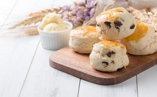 scones on wood block with barley, photo