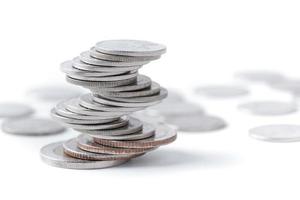 Coins stacked on each other in different positions. photo