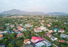aerial view of tower mobile phone in village photo