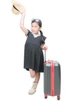 cute girl traveler with suitcase isolated photo